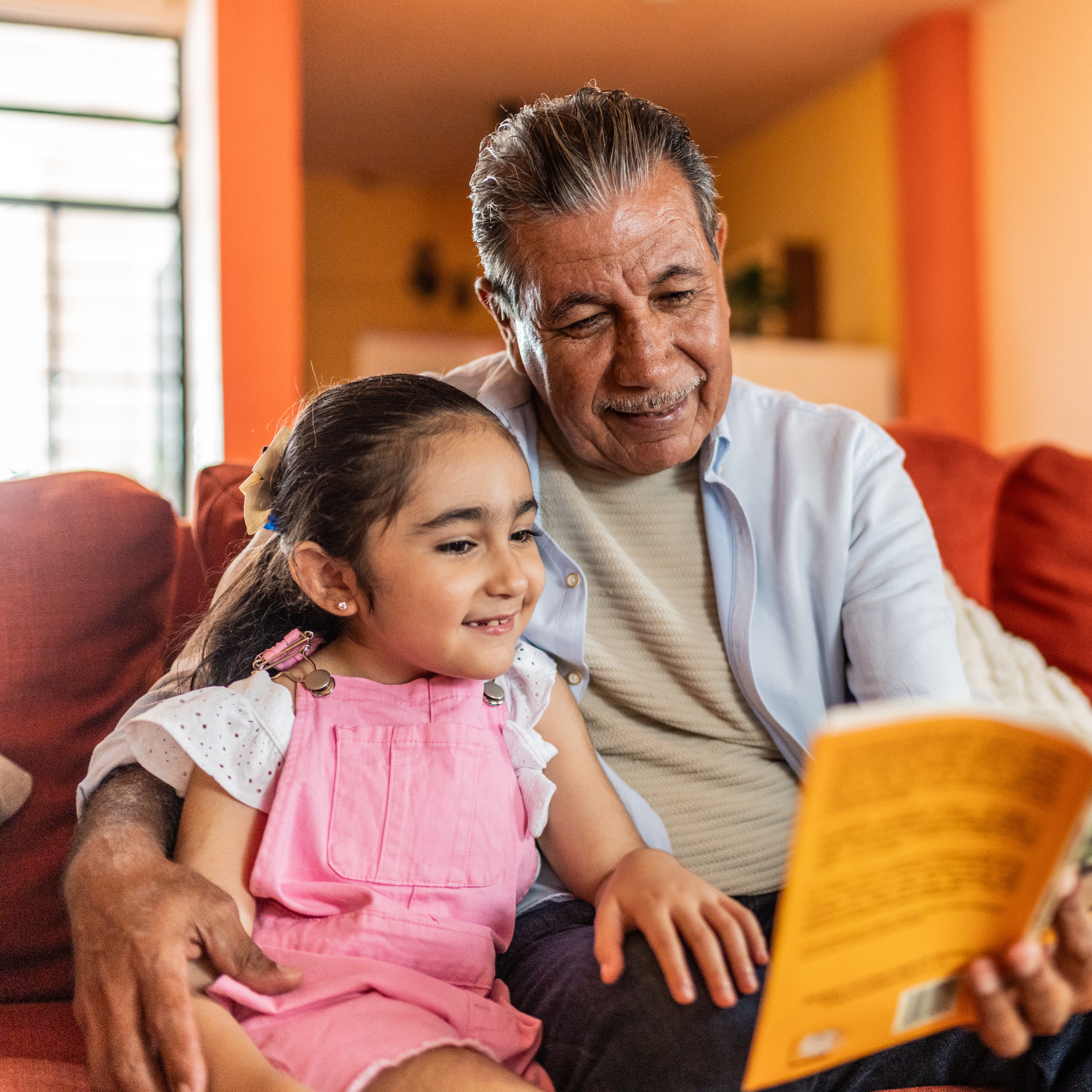 grandfather with his young grandaughter